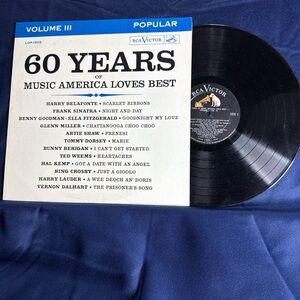 Black Vinyl Record - 60 Years of Music America Loves Best